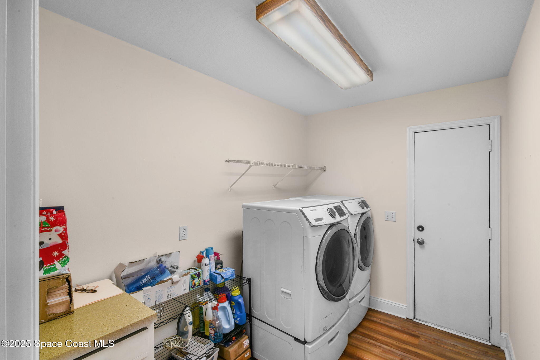 1873 Carrin Street Deltona, FL 32738 - Photo 28 of 54 a utility room with dryer and washer