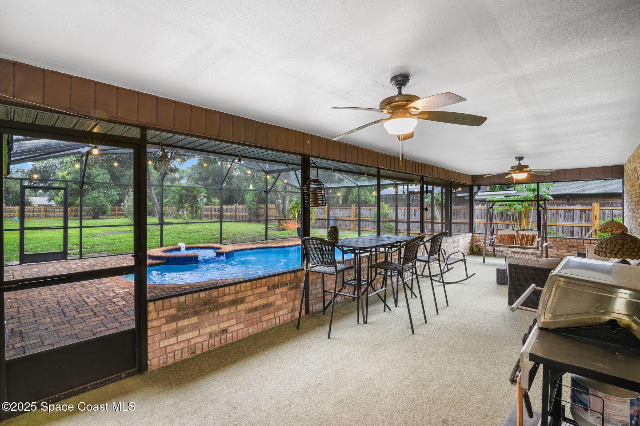 1873 Carrin Street Deltona, FL 32738 - Photo 29 of 54 a dining room with furniture water view and a floor to ceiling window