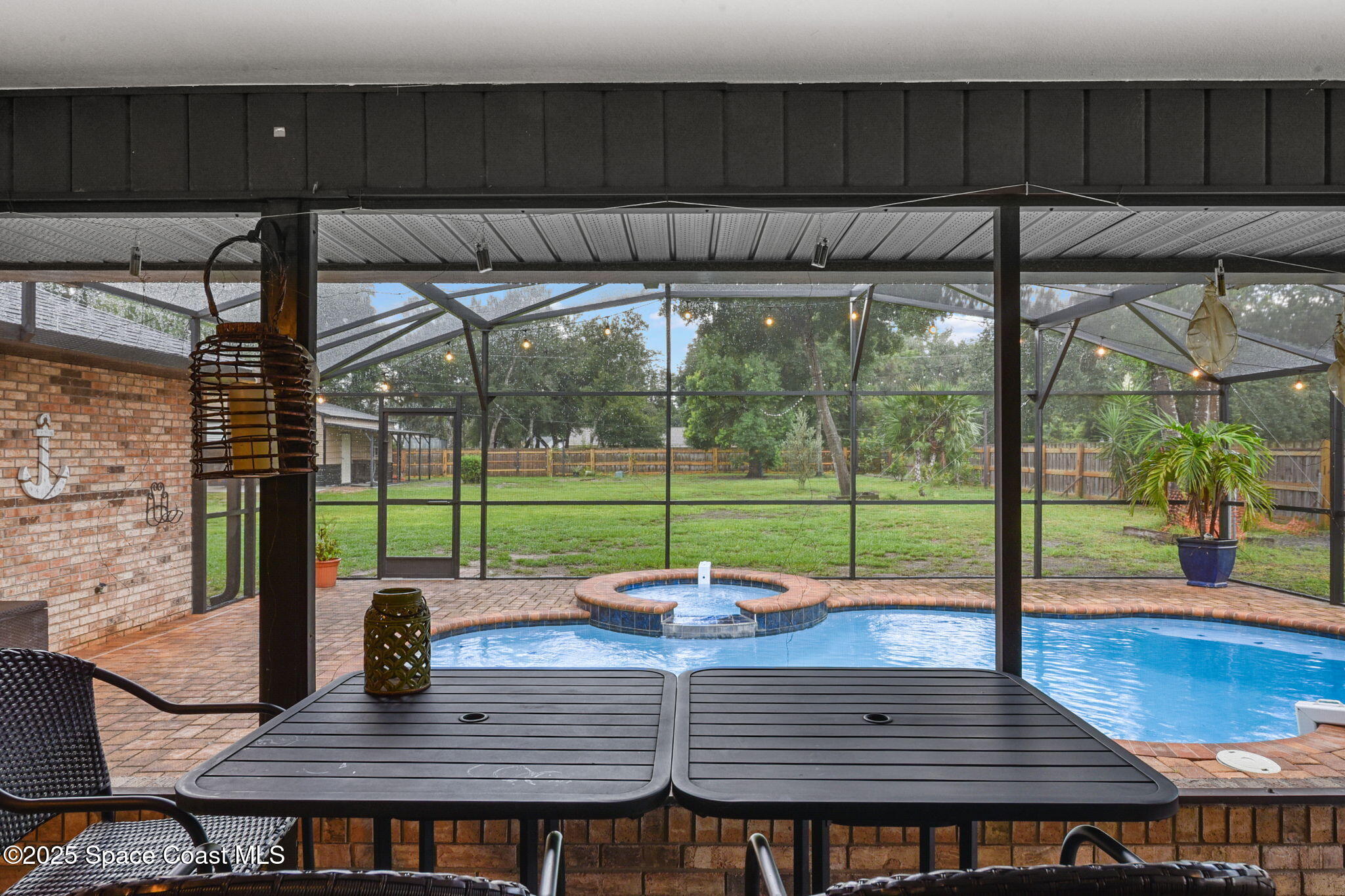 1873 Carrin Street Deltona, FL 32738 - Photo 31 of 54 a view of a deck with couches chairs with wooden floor