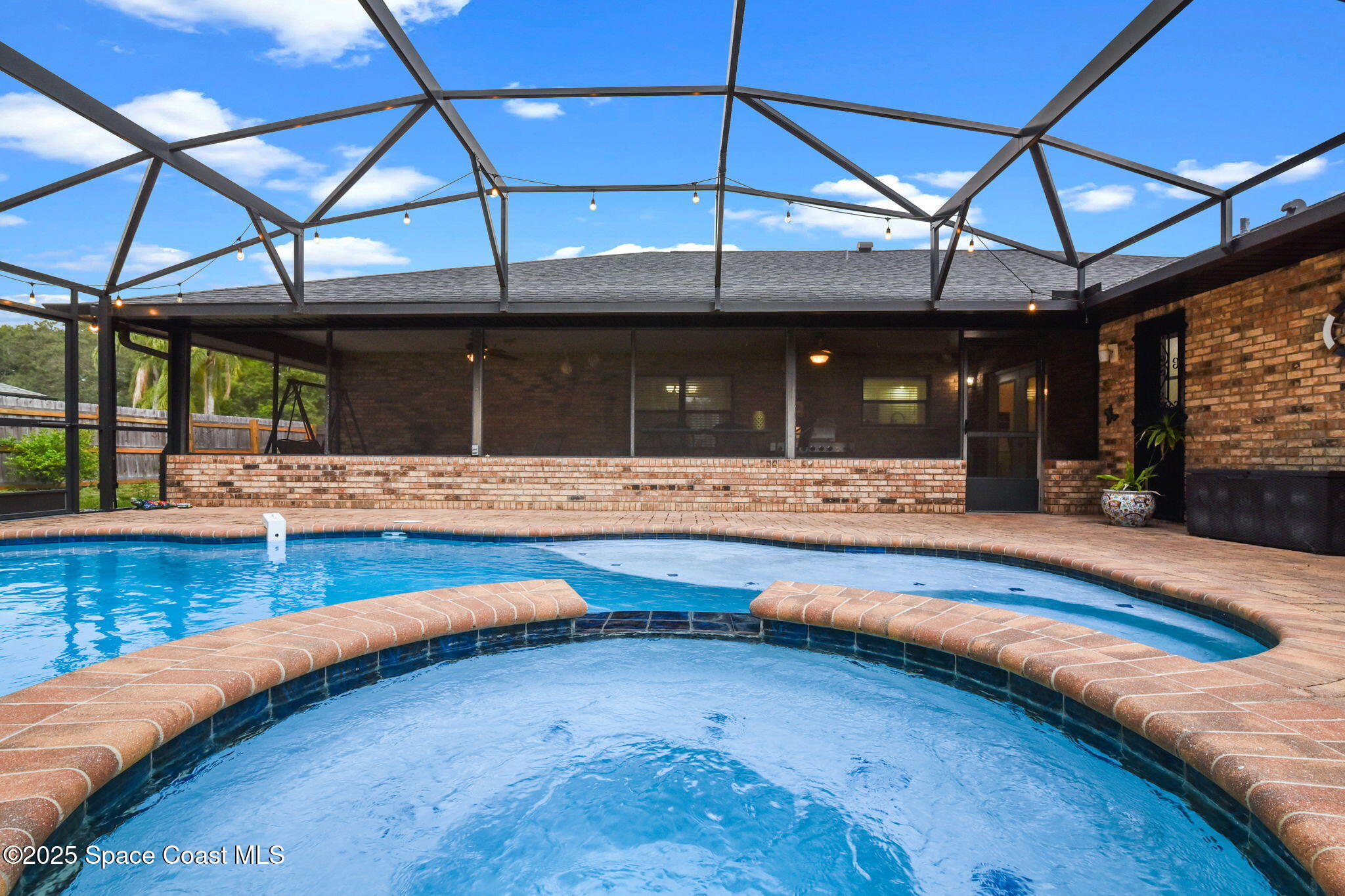 1873 Carrin Street Deltona, FL 32738 - Photo 34 of 54 a view of swimming pool with a outdoor seating