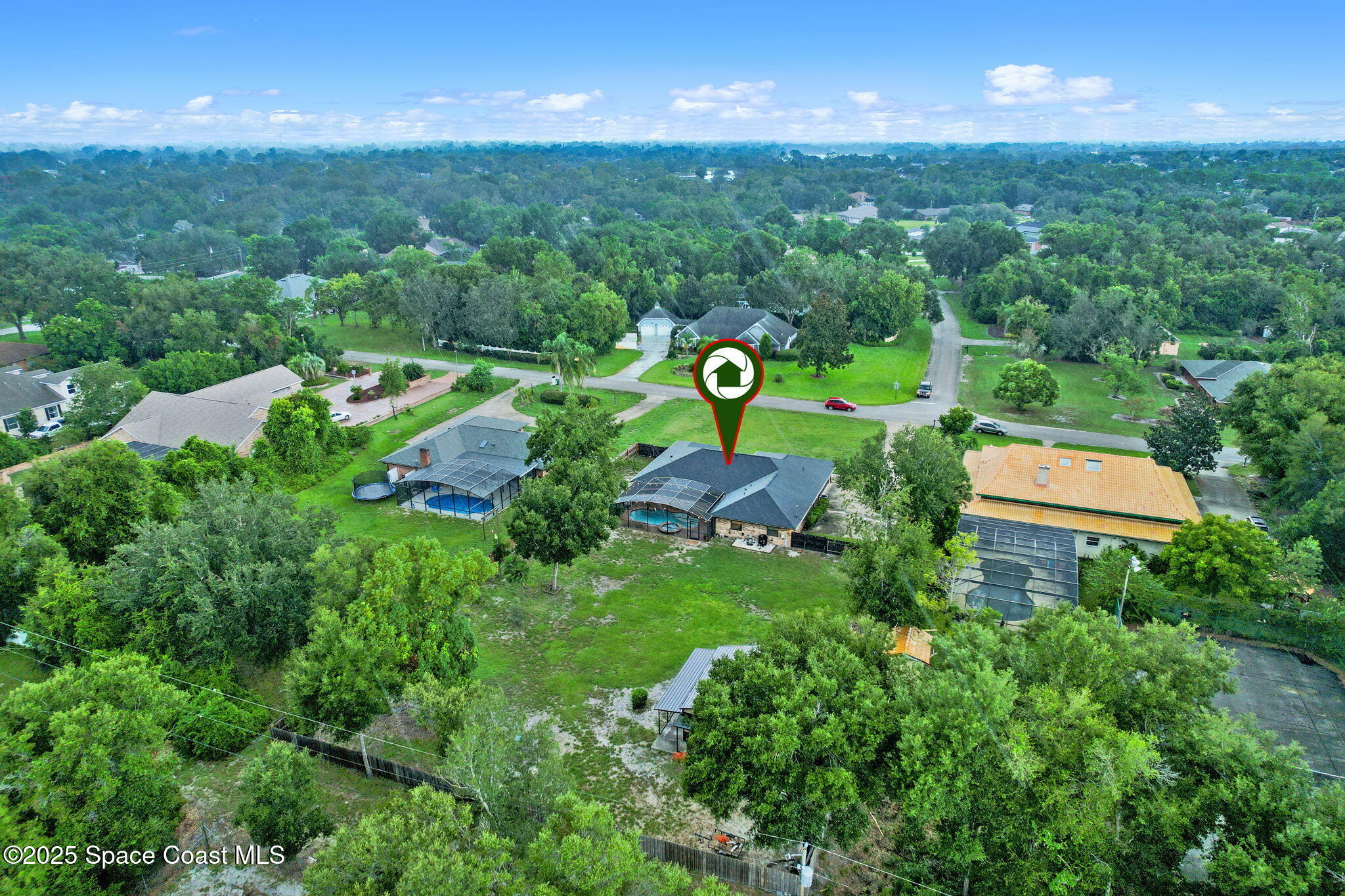 1873 Carrin Street Deltona, FL 32738 - Photo 46 of 54 an aerial view of a house with yard swimming pool and outdoor seating