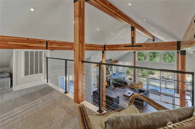a view of a living room and a balcony