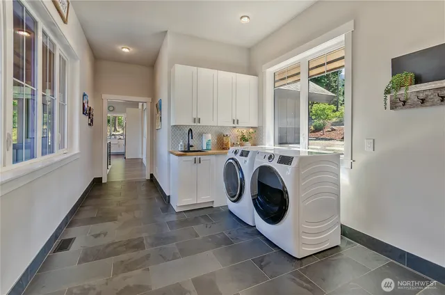 a utility room with dryer and washer