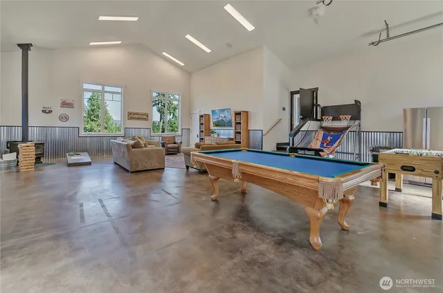 a living room with furniture and white walls