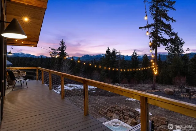 a view of a balcony with dining area