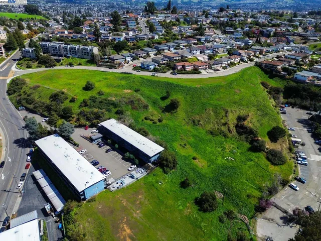an aerial view of a house with a garden
