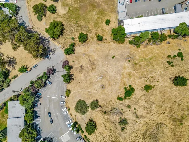 an aerial view of residential building and city view