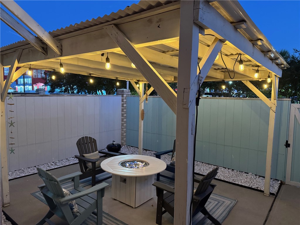 14439 Compass Street, Unit B Corpus Christi, TX 78418 - Photo 3 of 22 a view of porch with furniture and next to a yard