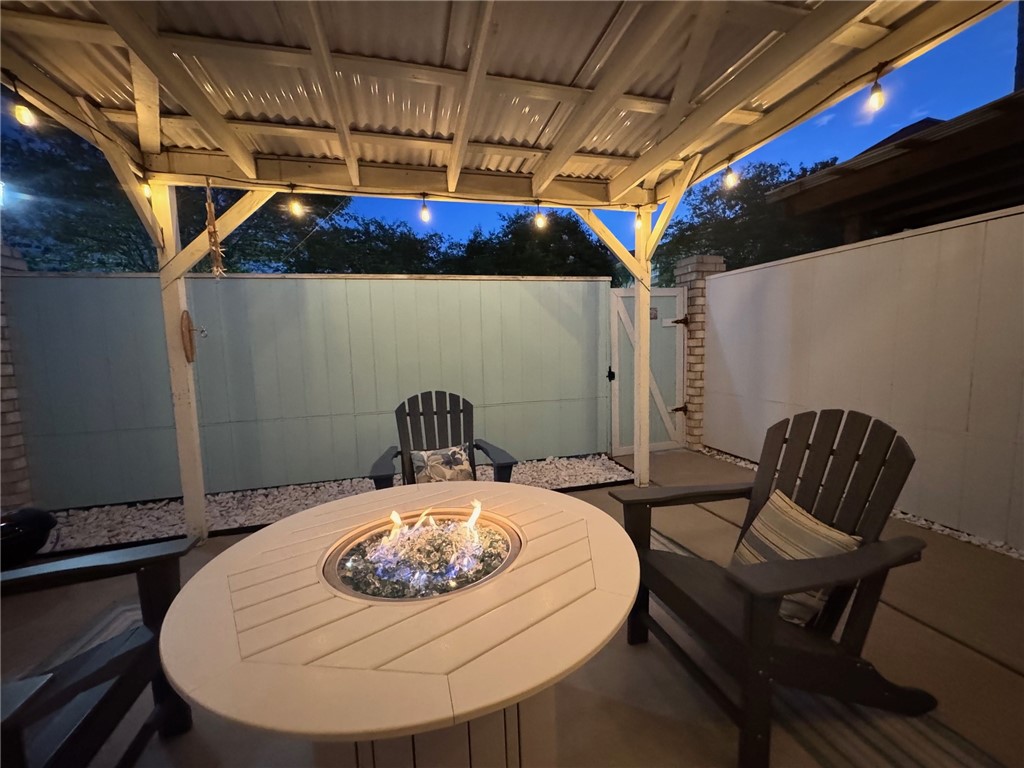 14439 Compass Street, Unit B Corpus Christi, TX 78418 - Photo 4 of 22 a table and chairs in a blue room