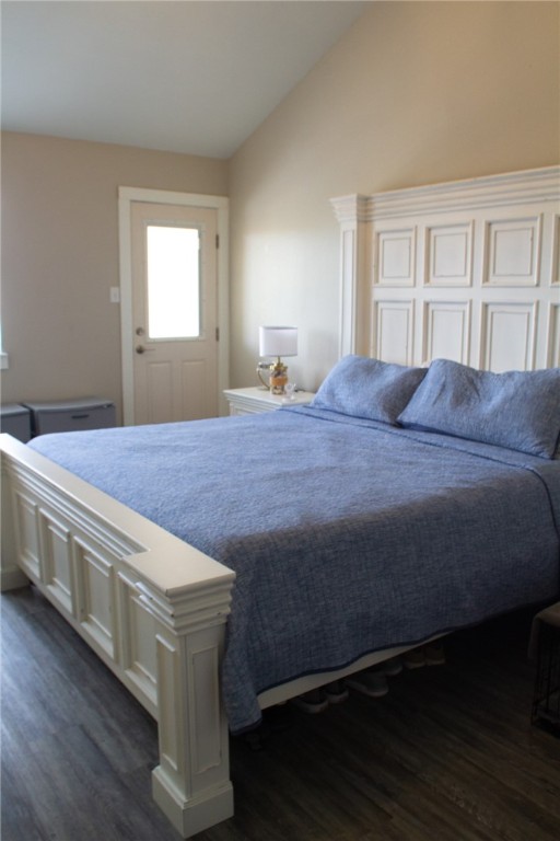 14439 Compass Street, Unit B Corpus Christi, TX 78418 - Photo 10 of 22 a bedroom with a bed and a window