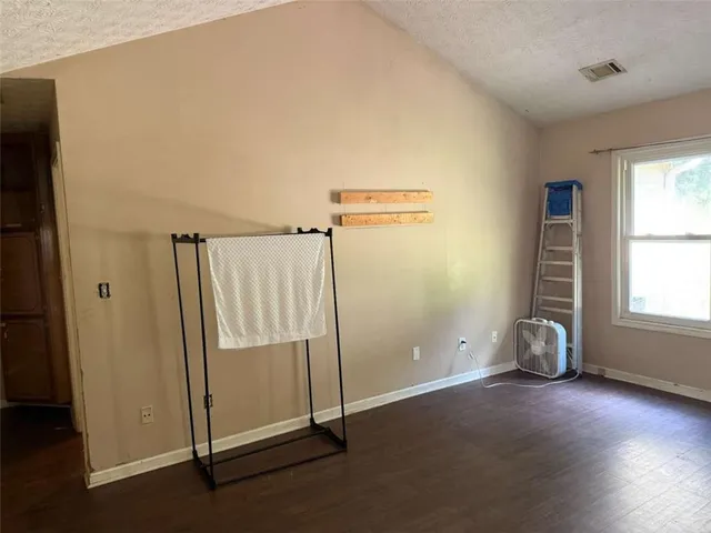 an empty room with windows