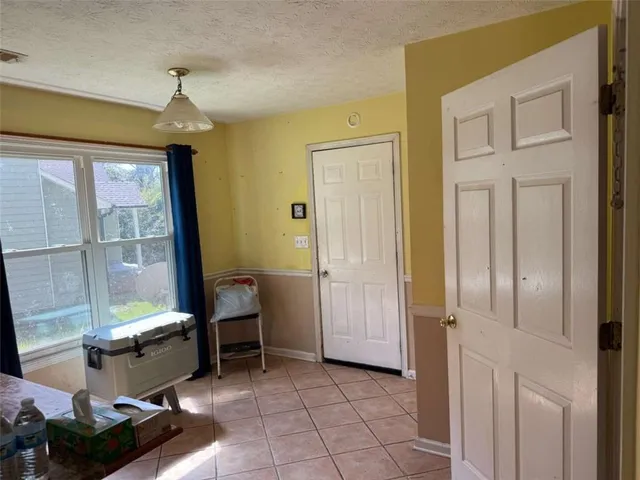 a room with furniture and a window