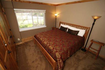 9 Vail Road, Unit 1J Vail, CO 81657 - Photo 6 of 14 a bed sitting in a bedroom next to a window