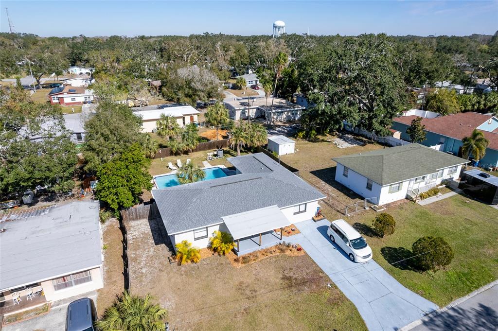 1344 Springdale Street Clearwater, FL 33755 - Photo 2 of 34 an aerial view of residential houses with outdoor space