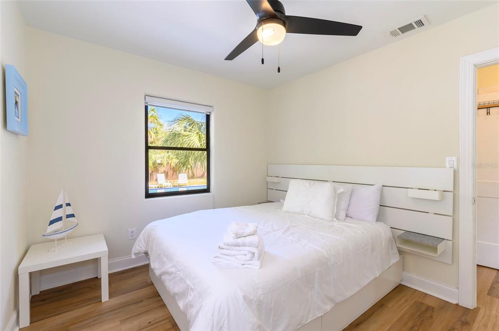 1344 Springdale Street Clearwater, FL 33755 - Photo 26 of 34 a bedroom with a bed and a window