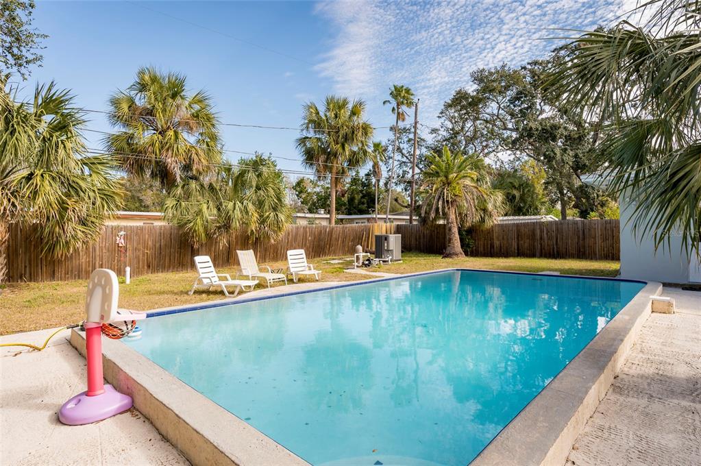 1344 Springdale Street Clearwater, FL 33755 - Photo 28 of 34 a view of swimming pool with chairs