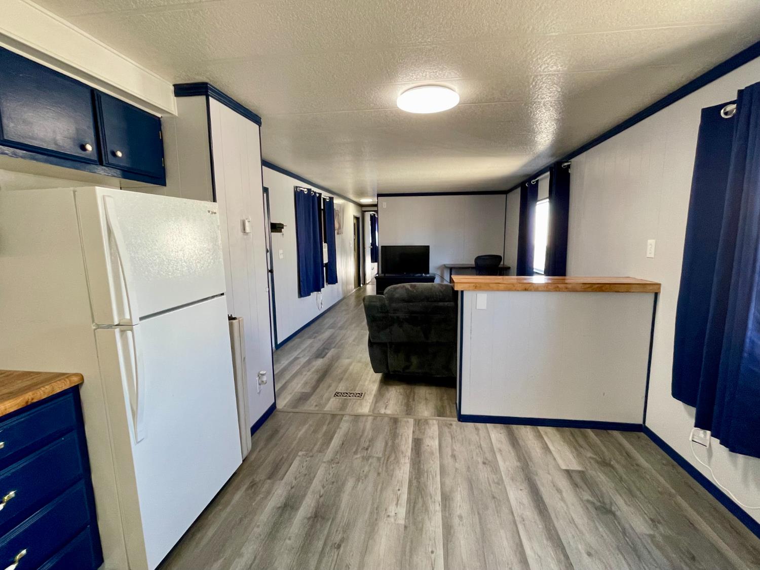3998 Castro Valley Boulevard, Unit 34 Castro Valley, CA 94546 - Photo 5 of 17 Kitchen opens up to living room.