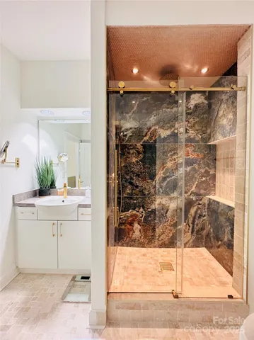 a bathroom with a sink and toilet