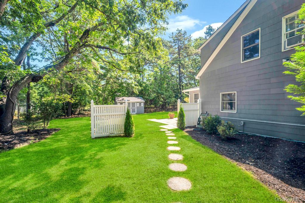 5 Panther Path Miller Place, NY 11764 - Photo 11 of 37 View of yard with a storage shed