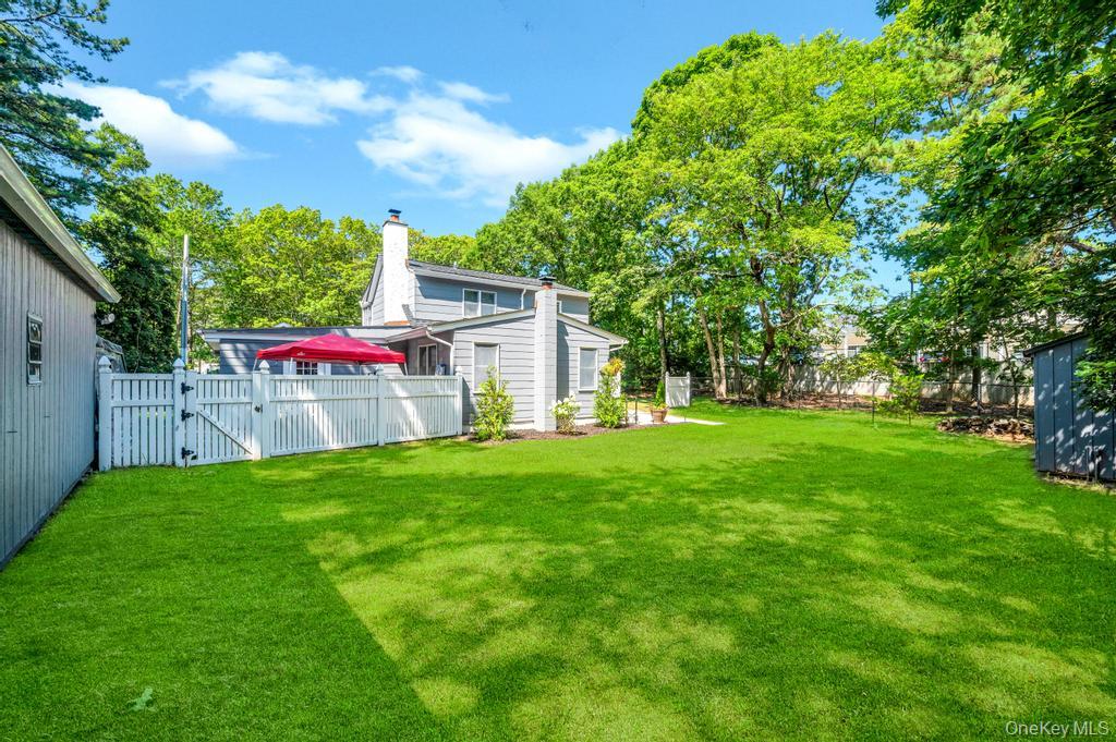 5 Panther Path Miller Place, NY 11764 - Photo 8 of 37 Fenced backyard with a gate