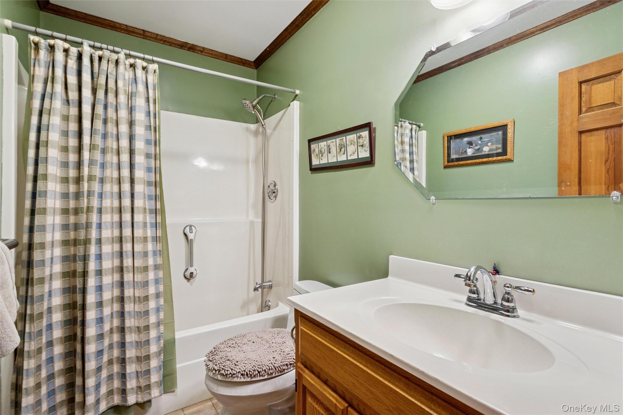 686 Traver Road Pleasant Valley, NY 12569 - Photo 13 of 37 a bathroom with a sink a toilet and shower