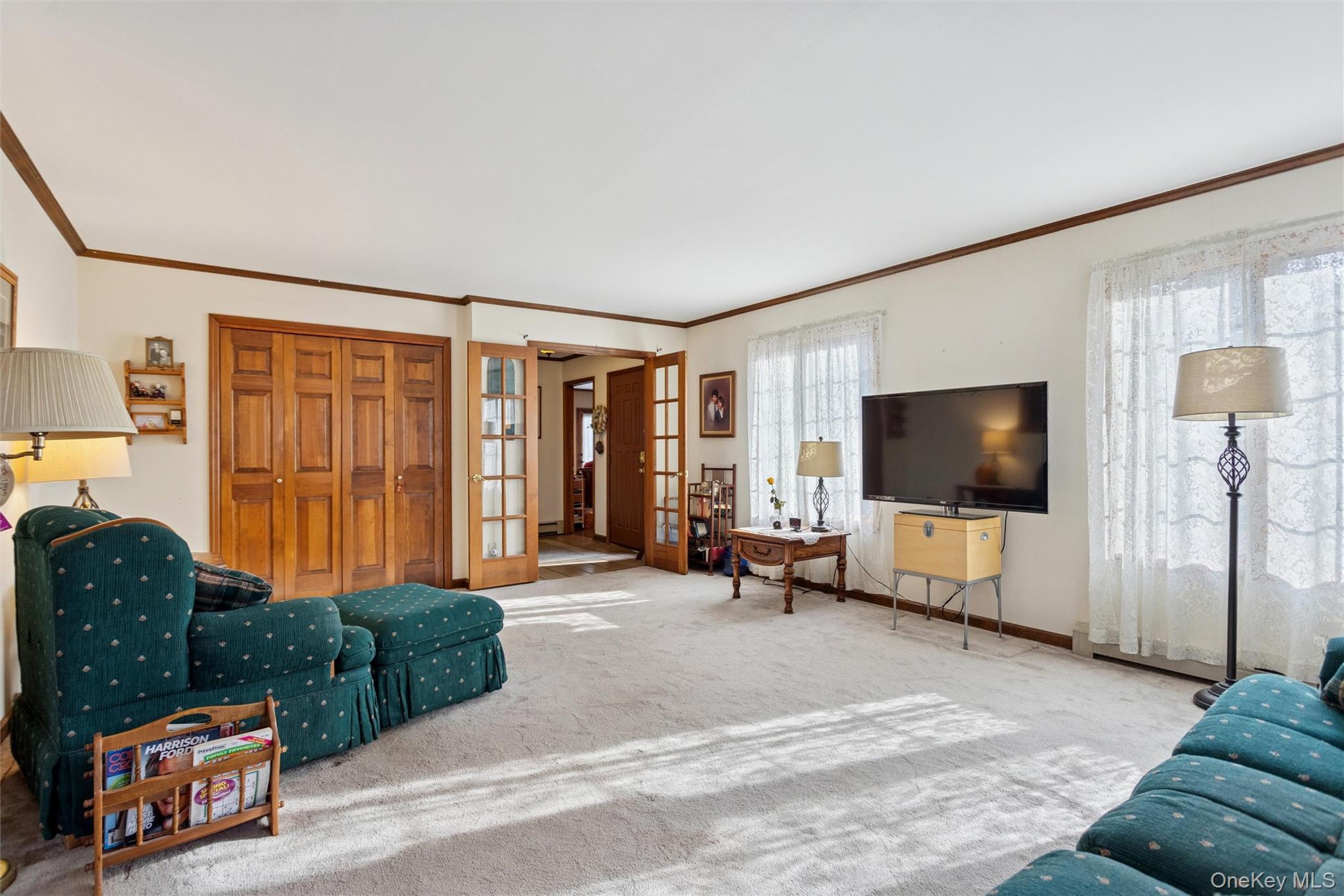 686 Traver Road Pleasant Valley, NY 12569 - Photo 19 of 37 a living room with furniture and a flat screen tv
