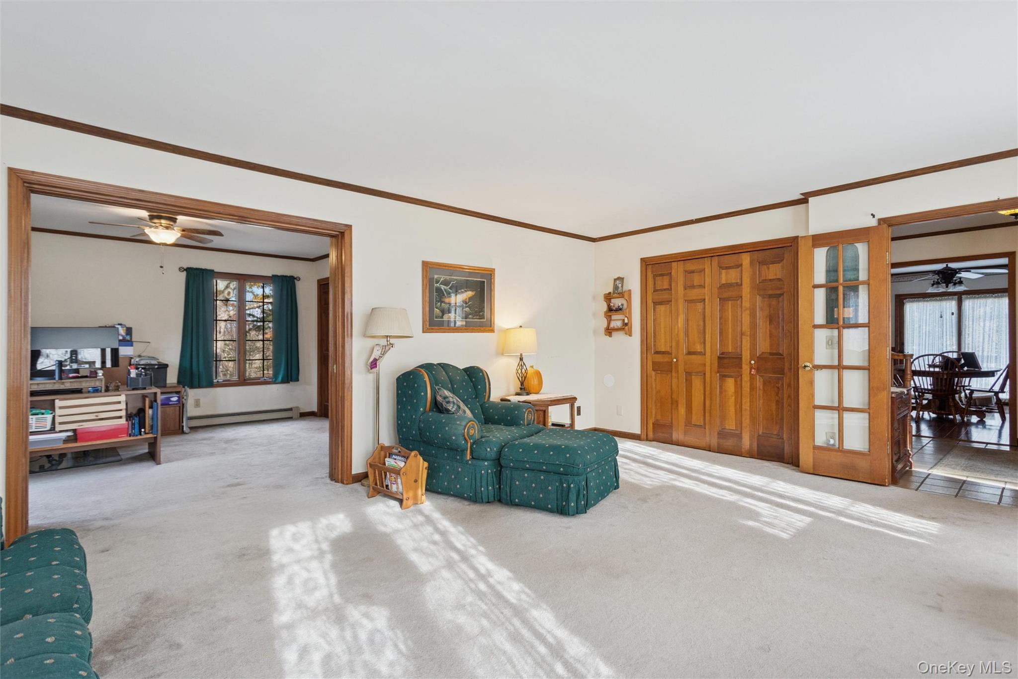 686 Traver Road Pleasant Valley, NY 12569 - Photo 20 of 37 a living room with furniture and a flat screen tv