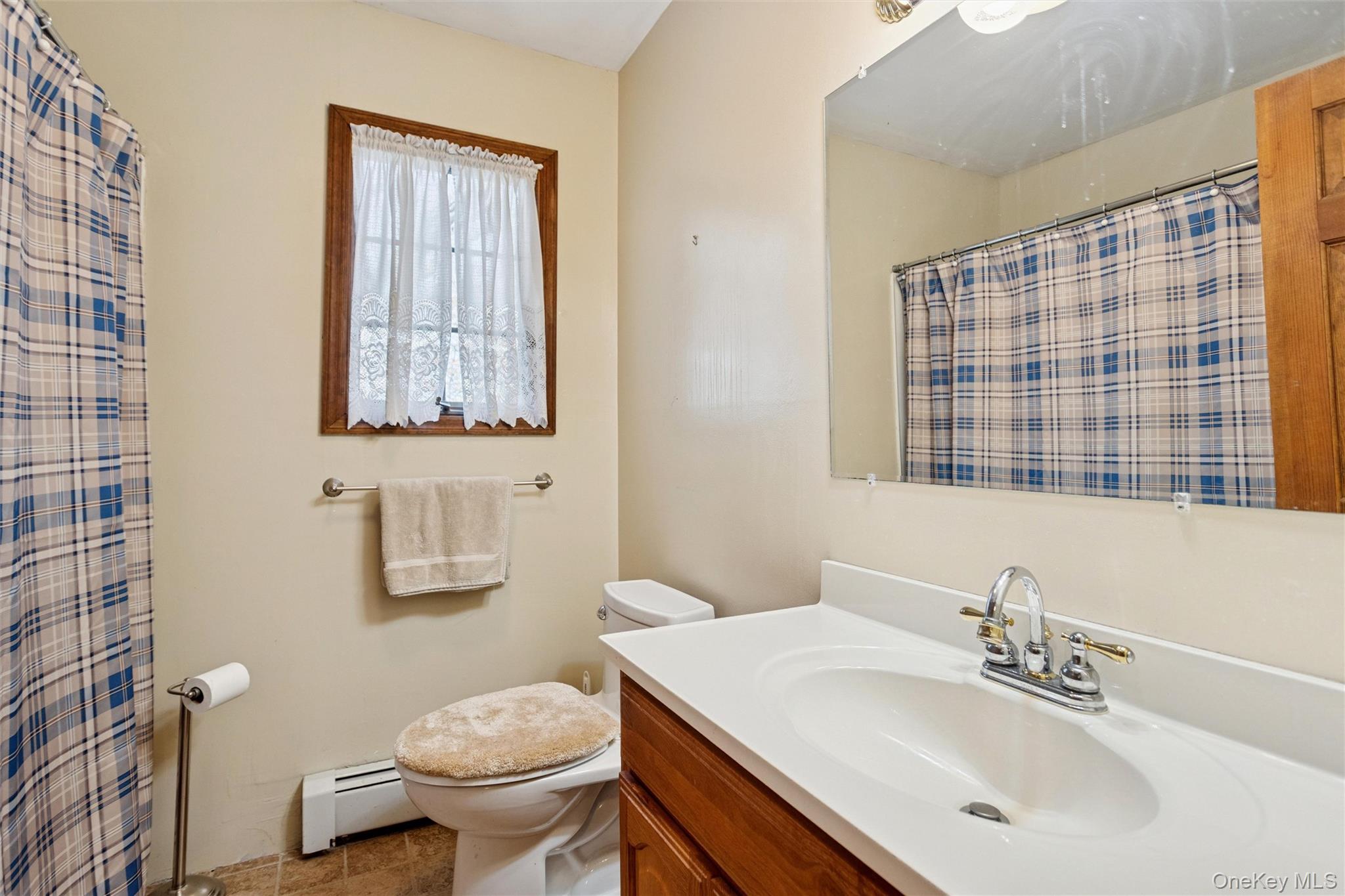 686 Traver Road Pleasant Valley, NY 12569 - Photo 22 of 37 a bathroom with a sink toilet and shower
