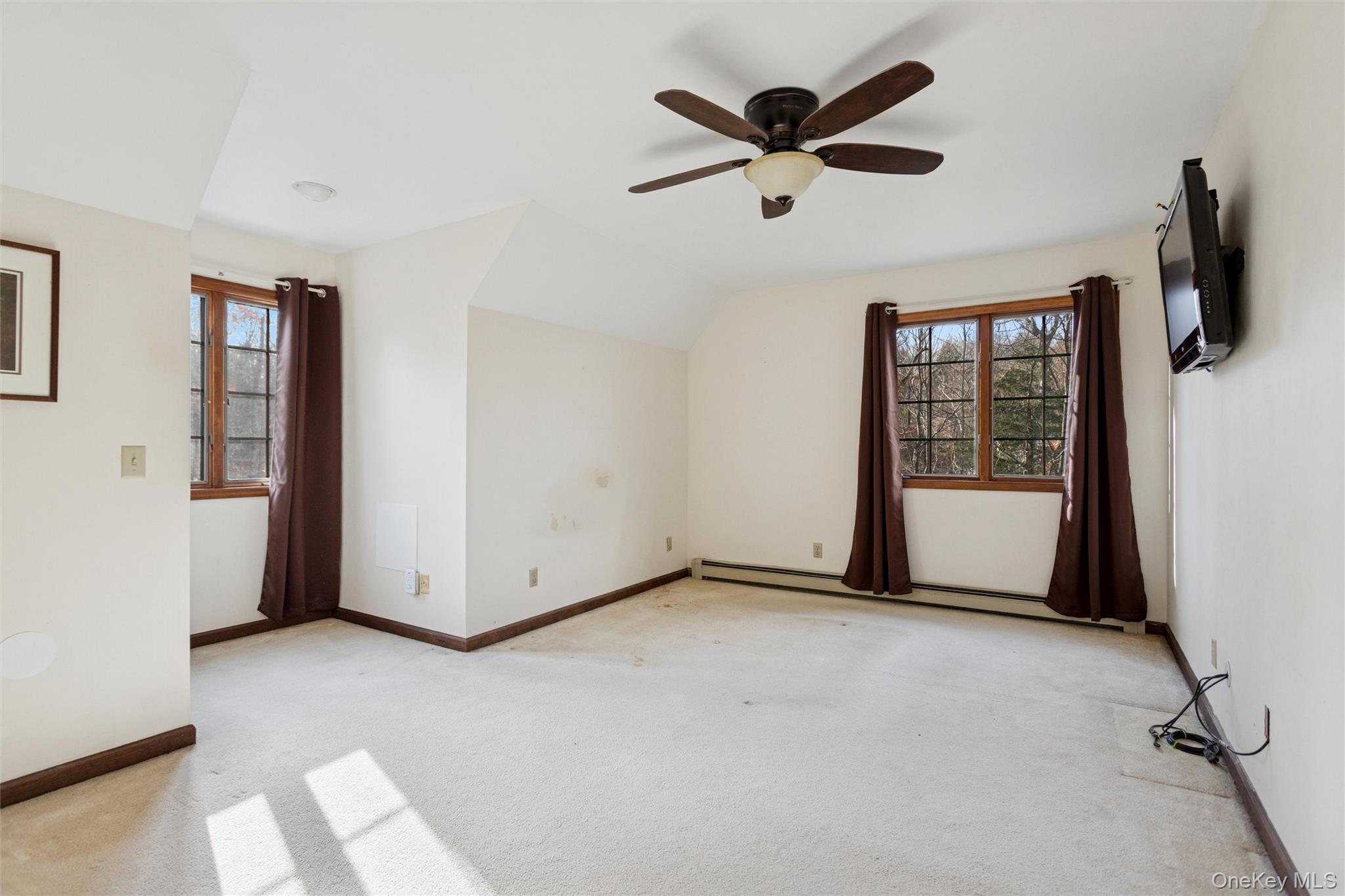 686 Traver Road Pleasant Valley, NY 12569 - Photo 23 of 37 a view of a livingroom with a ceiling fan and window