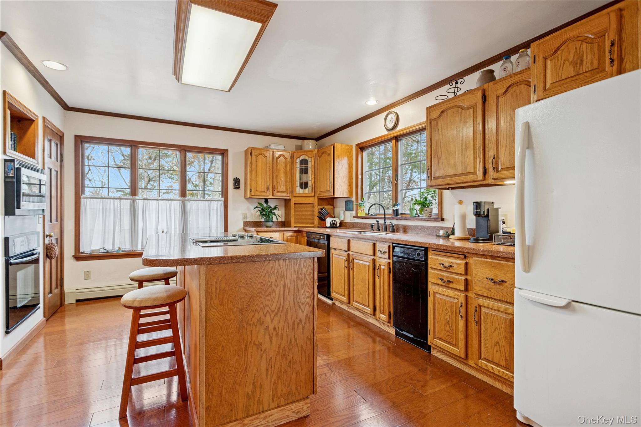 686 Traver Road Pleasant Valley, NY 12569 - Photo 8 of 37 a kitchen with stainless steel appliances granite countertop a stove a sink and a refrigerator