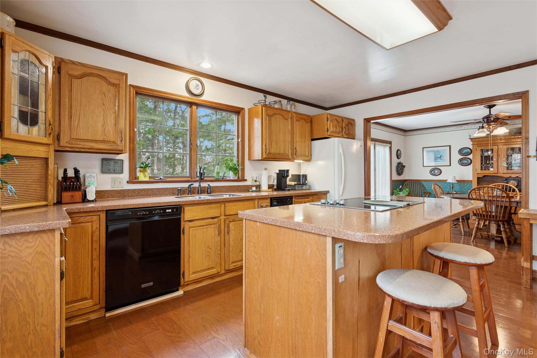 686 Traver Road Pleasant Valley, NY 12569 - Photo 9 of 37 a kitchen with stainless steel appliances granite countertop a stove a sink and a refrigerator