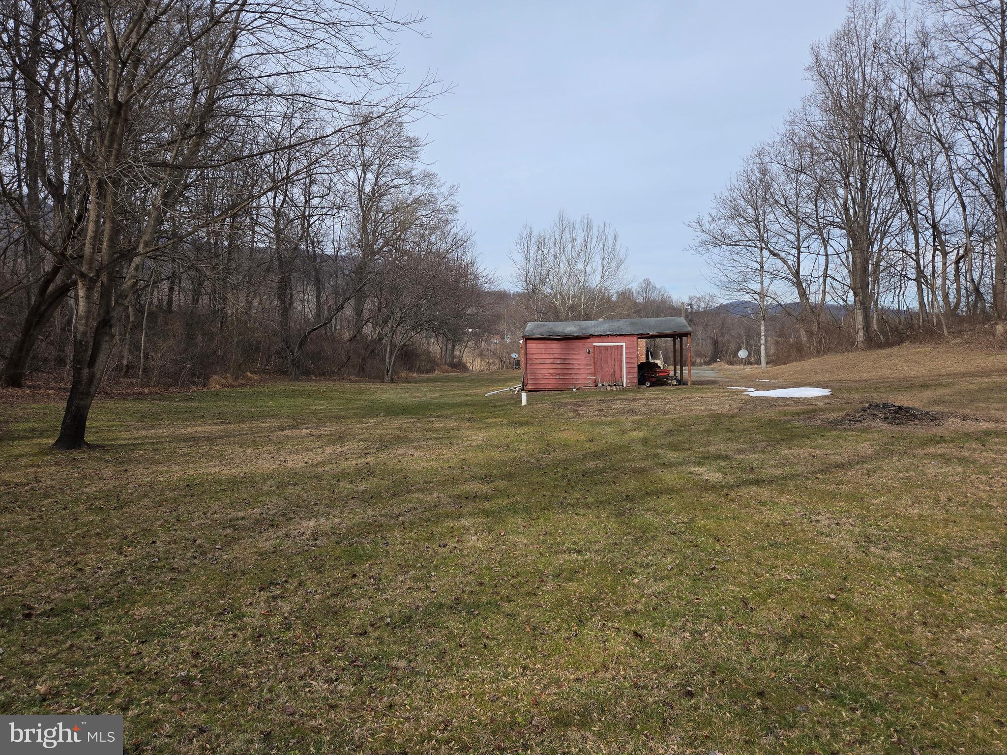 2996 Etlan Road Etlan, VA 22719 - Photo 19 of 24 a view of a house with a yard