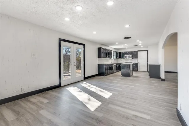 a view of kitchen with wooden floor