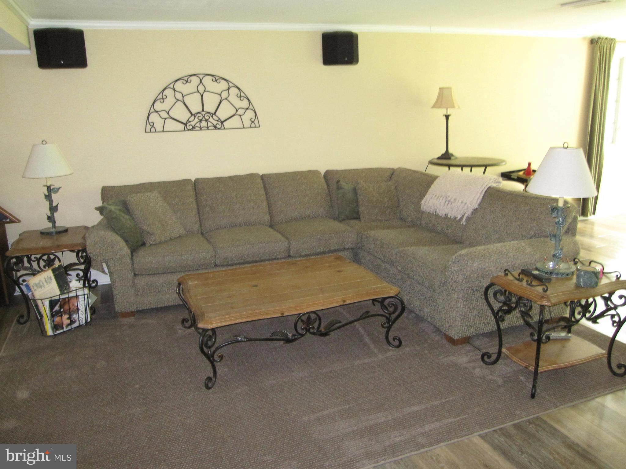 906 Huntsman Road Baltimore, MD 21286 - Photo 30 of 30 a living room with furniture and a couch