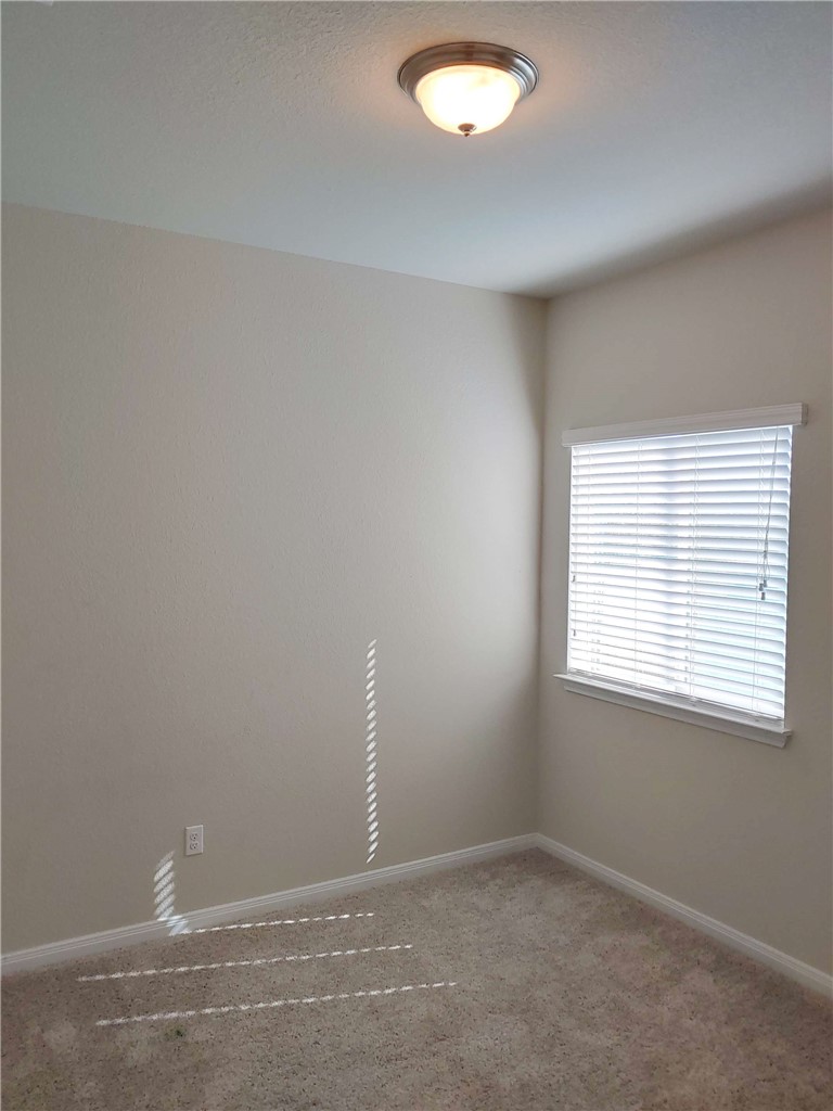 636 Donegal Lane Georgetown, TX 78626 - Photo 11 of 15 an empty room with a window