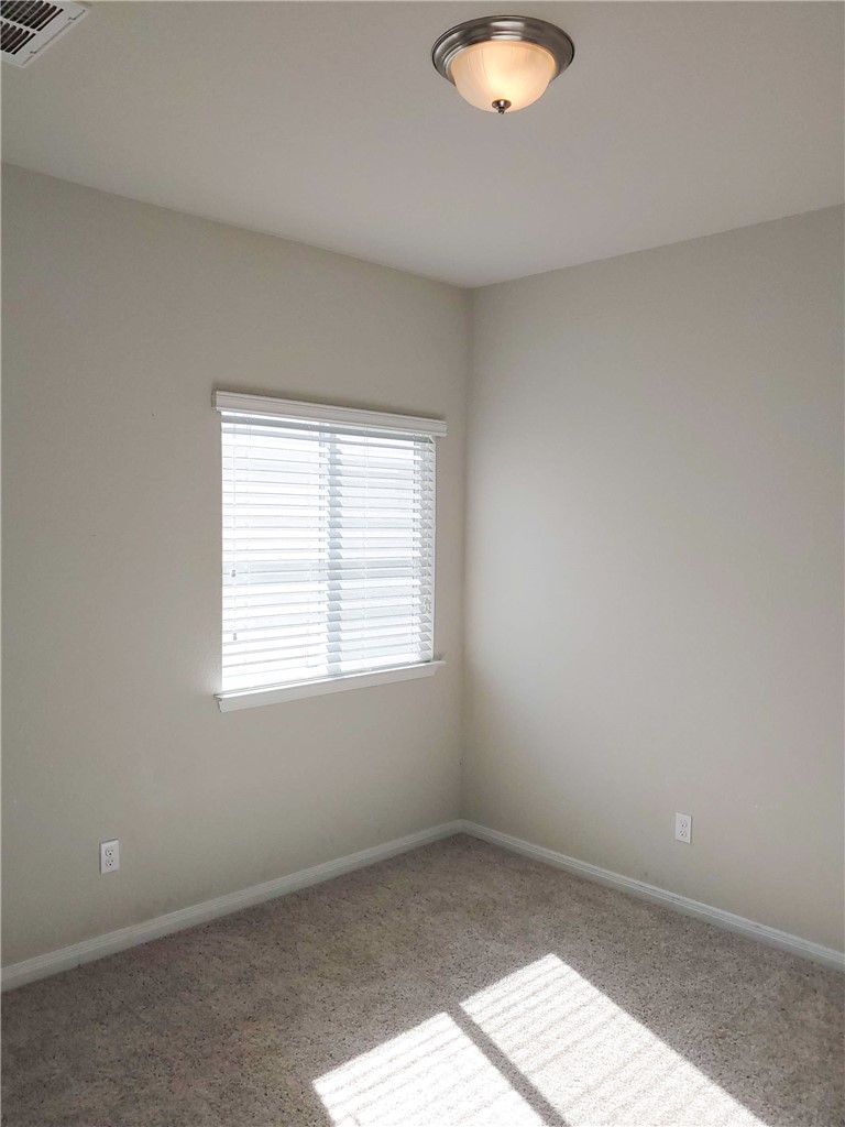 636 Donegal Lane Georgetown, TX 78626 - Photo 12 of 15 an empty room with a window