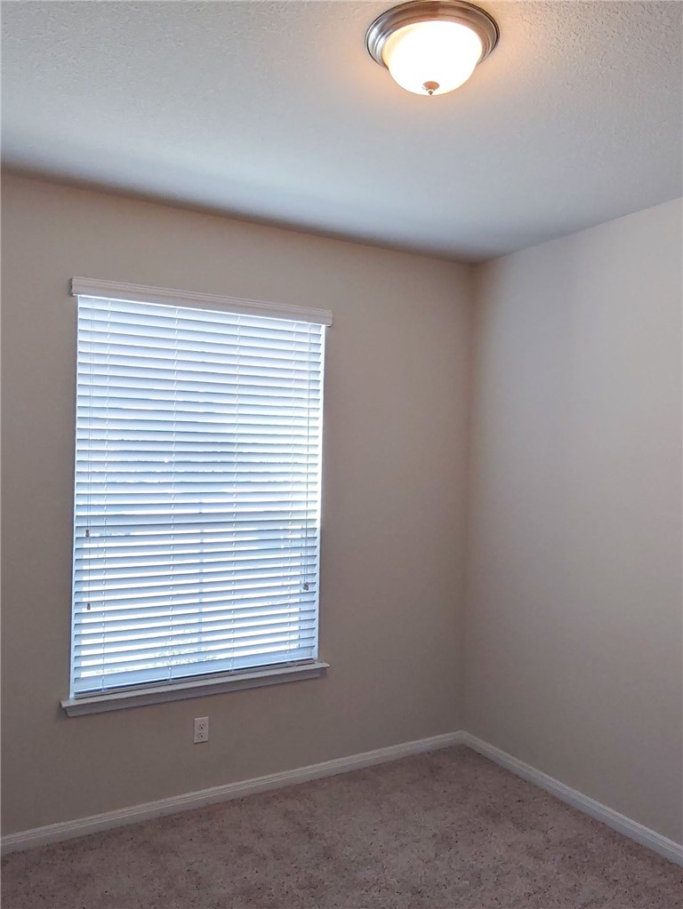636 Donegal Lane Georgetown, TX 78626 - Photo 13 of 15 an empty room with a window