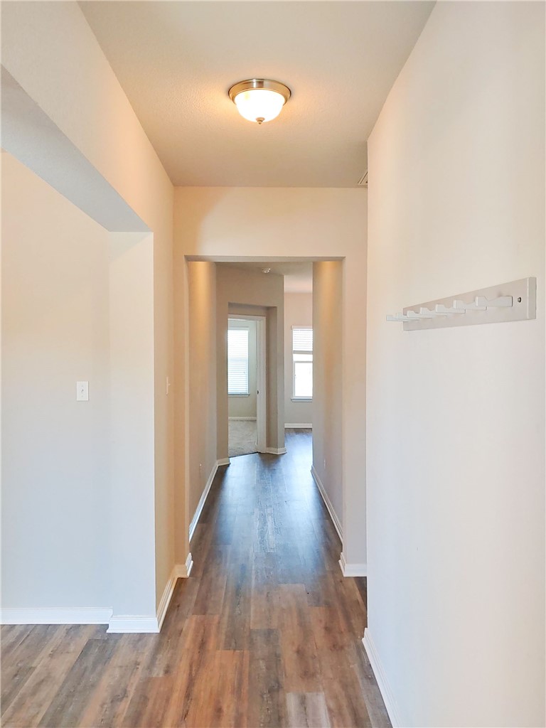 636 Donegal Lane Georgetown, TX 78626 - Photo 2 of 15 a view of a room with wooden floor