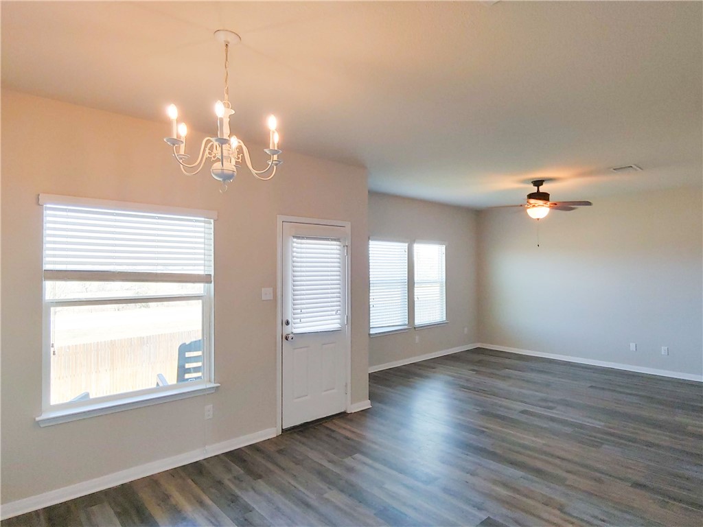 636 Donegal Lane Georgetown, TX 78626 - Photo 5 of 15 a view of empty room with wooden floor and fan