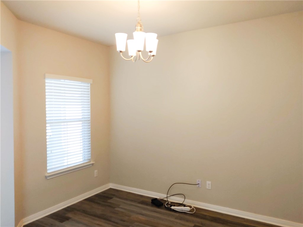 636 Donegal Lane Georgetown, TX 78626 - Photo 6 of 15 a room with a window and chandelier