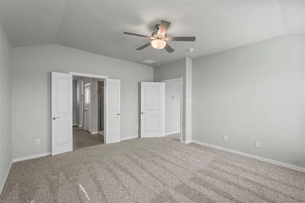a view of a livingroom with a ceiling fan