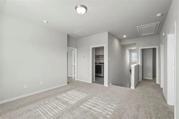 a view of a livingroom with wooden floor and closet