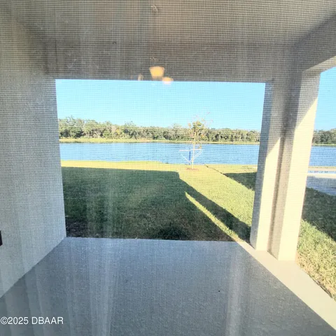 a view of a lake from a window