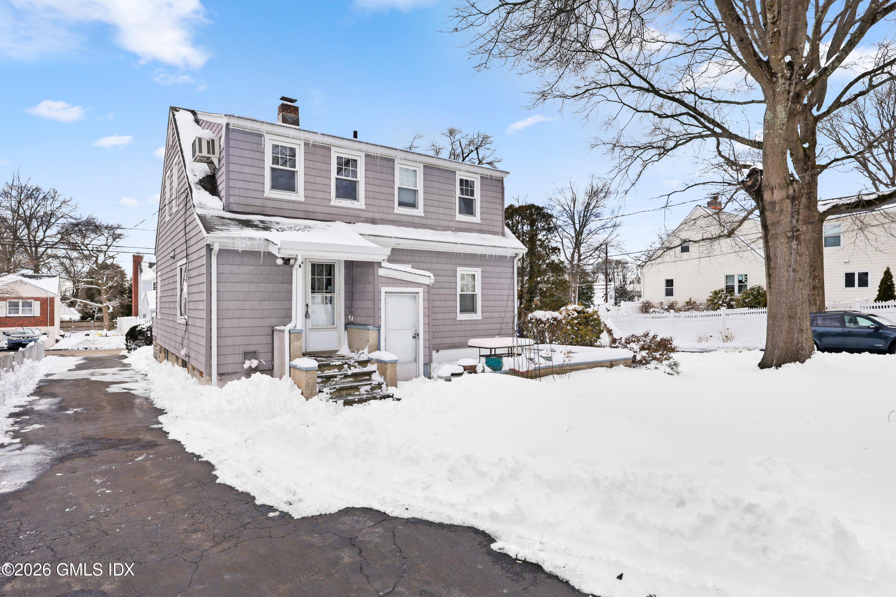 23 Thorn Hill Road Riverside, CT 06878 - Photo 20 of 26 Rear exterior with patio and yard