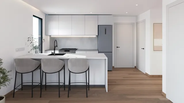 a bathroom with a sink a table and a chair