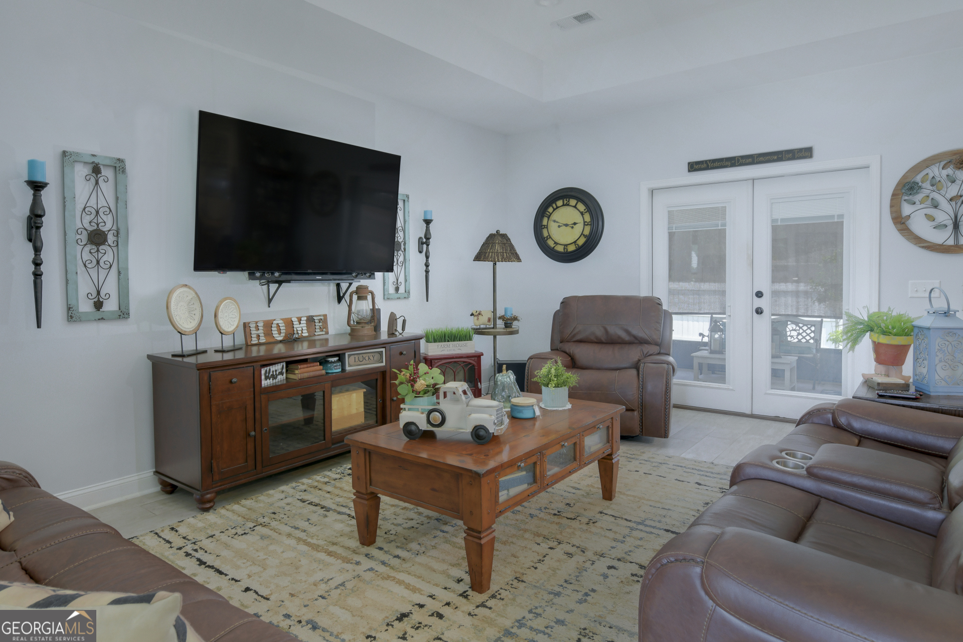 107 Elmo H Circle St. Marys, GA 31558 - Photo 14 of 31 a living room with furniture and a flat screen tv