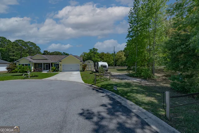 a aerial view of house with a yard