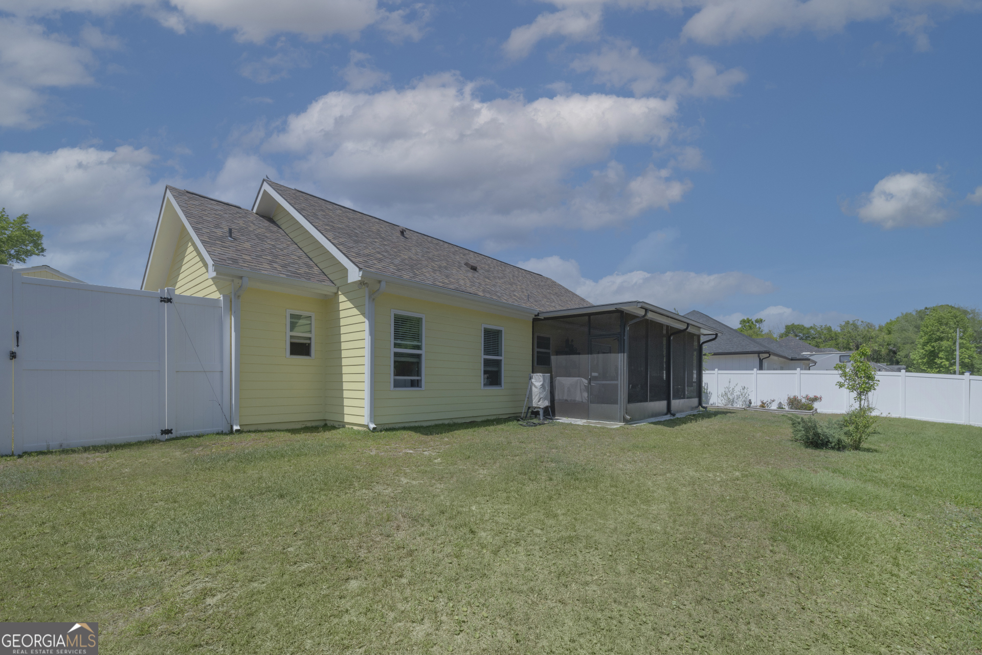 107 Elmo H Circle St. Marys, GA 31558 - Photo 21 of 31 a view of a house with a yard