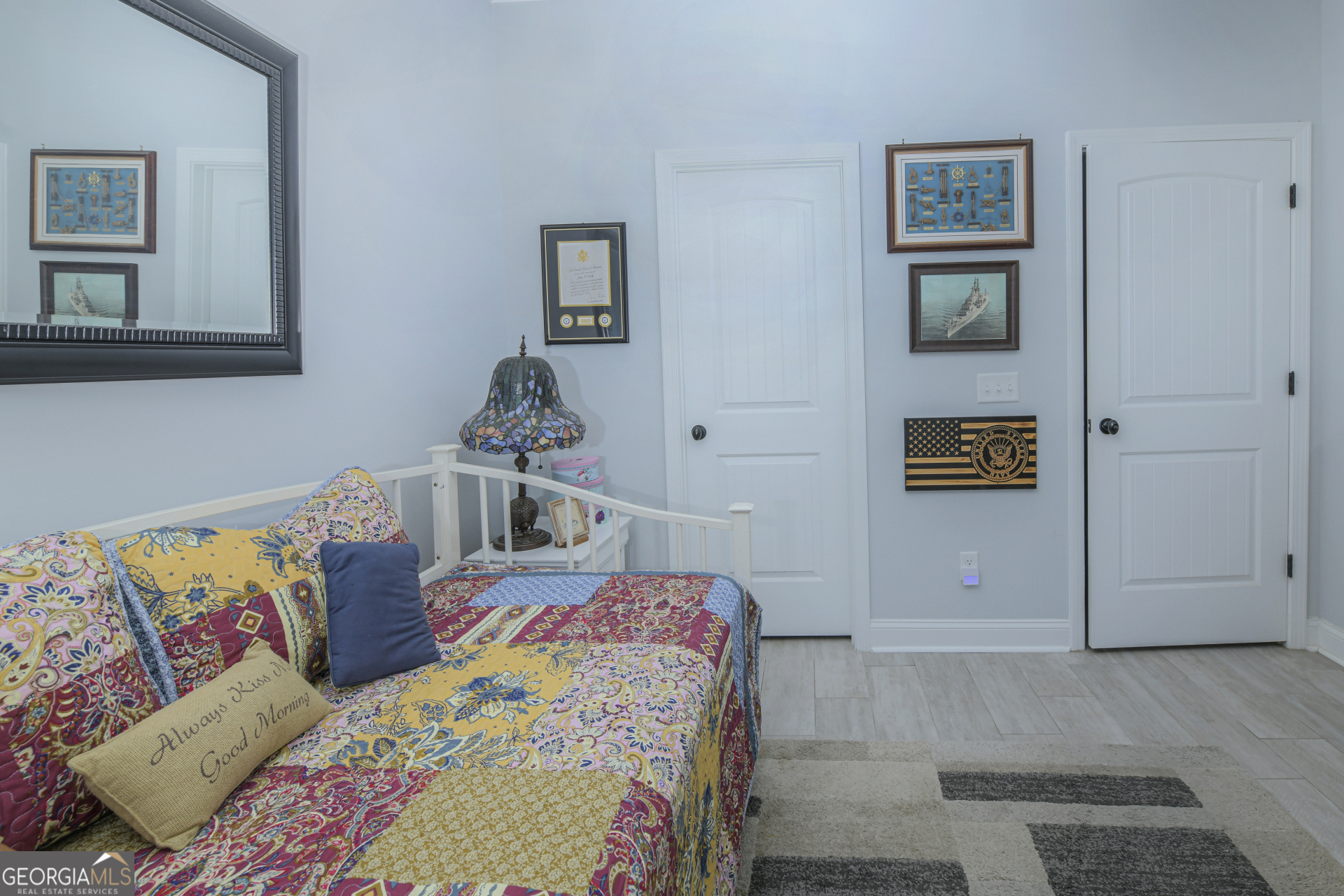 107 Elmo H Circle St. Marys, GA 31558 - Photo 23 of 31 a bedroom with a bed and cupboard