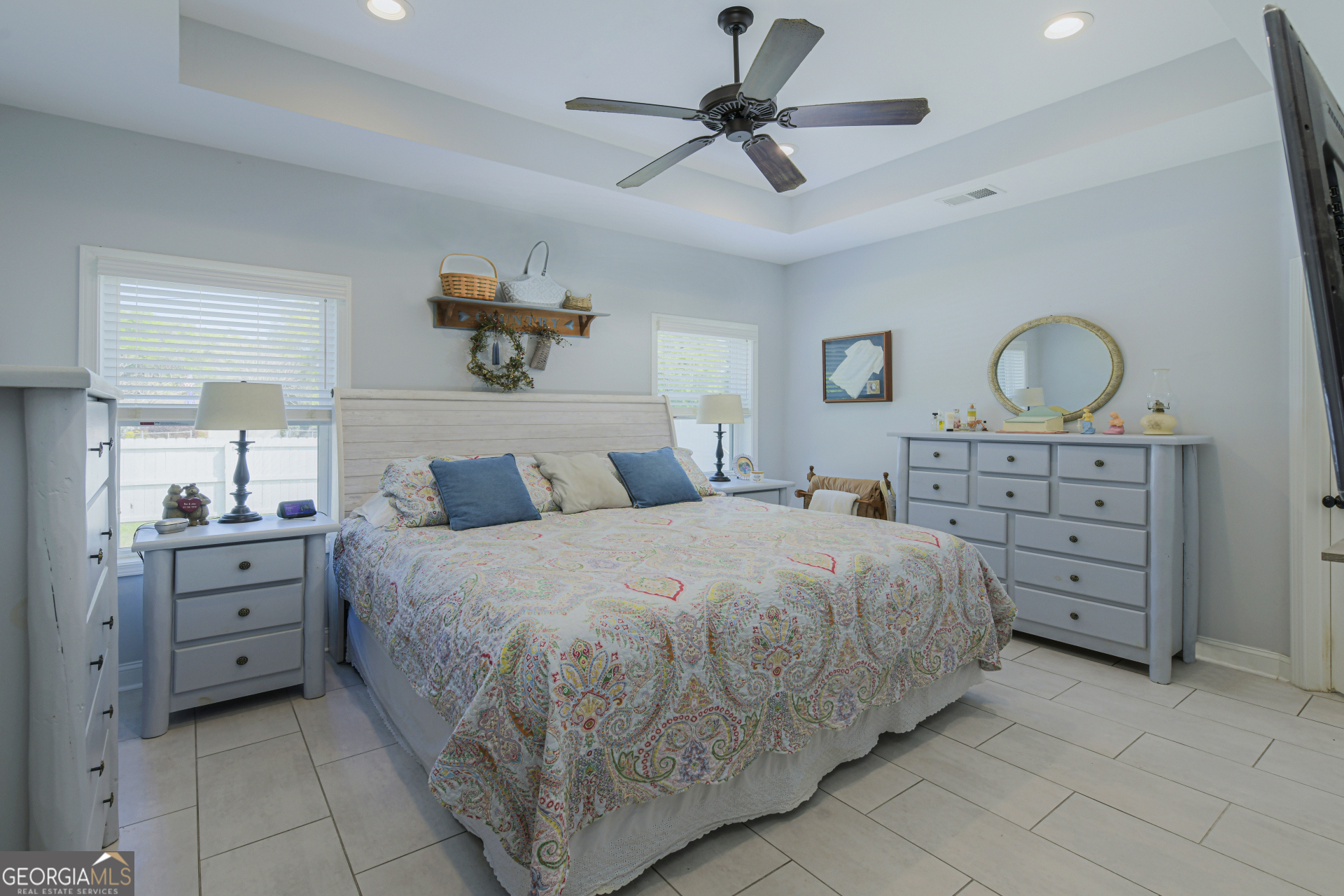 107 Elmo H Circle St. Marys, GA 31558 - Photo 27 of 31 a bedroom with a bed and a dresser